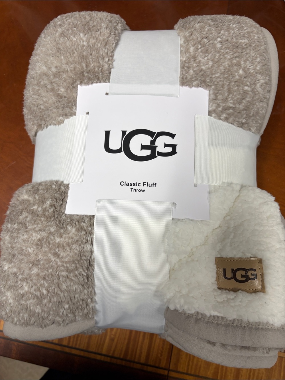 UGG Classic Fluff Throw Blanket in Taupe and Cream
